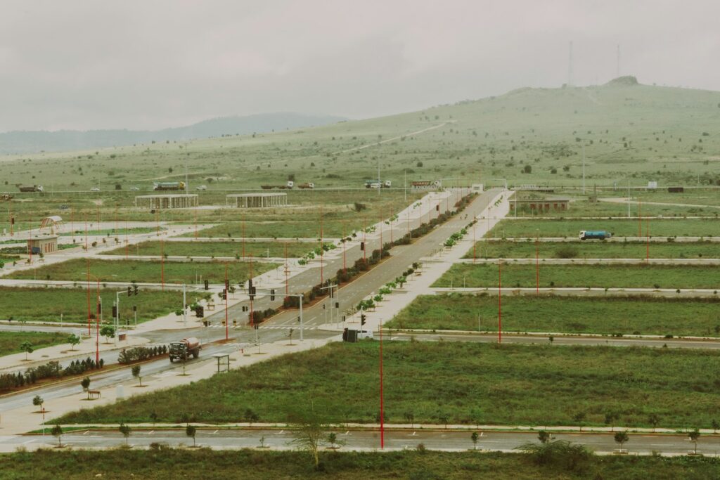 New development plots being demarcated in a grassy area near Varanasi